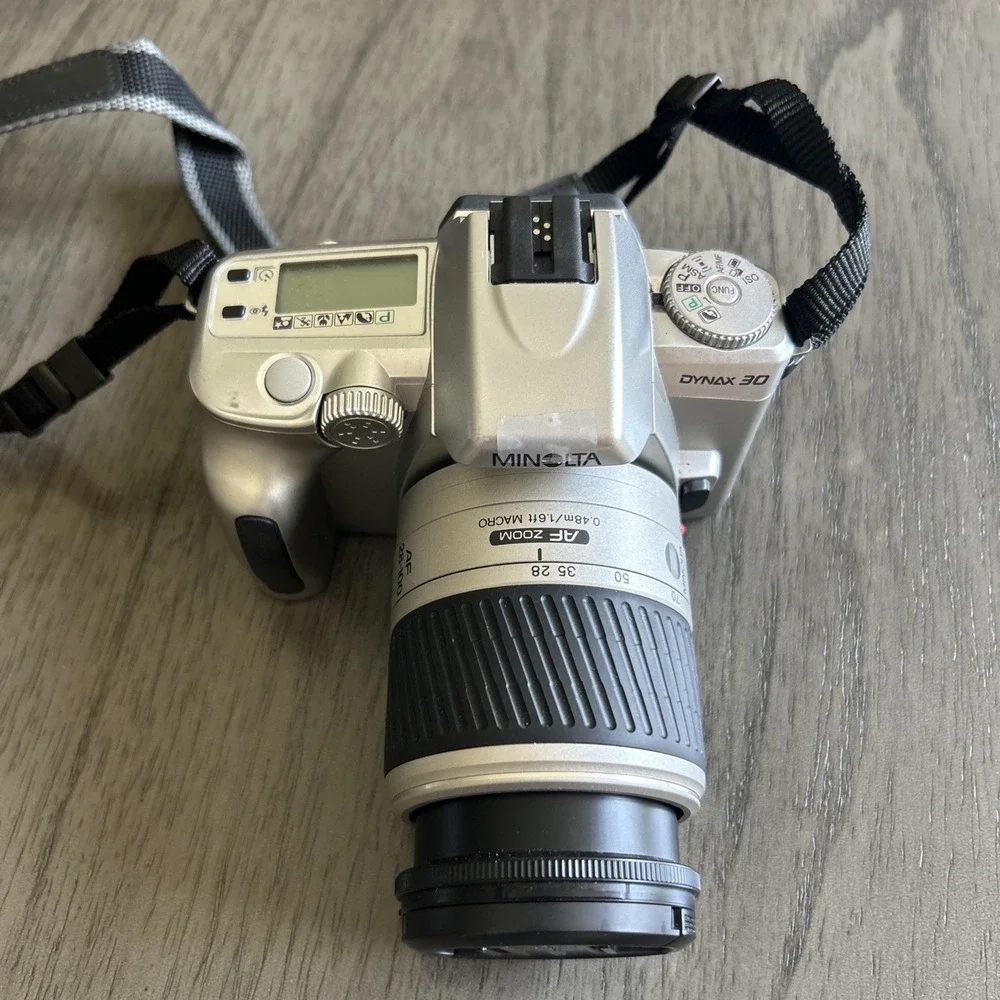 Minolta Dynax 30 Camera 28-10mm Lens Minolta Japan w/Straps UNTESTED FOR PARTS